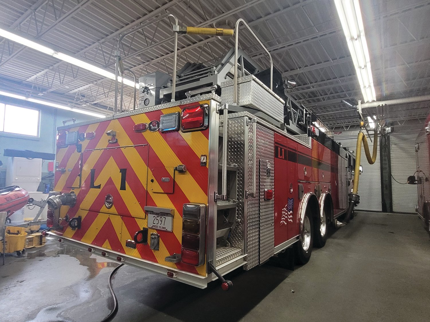 NEW TRUCK, OLD TRUCK: The Johnston Fire Department’s ladder truck will be put on reserve status once the town receives its new truck. The old truck has only been in service for less than eight years.